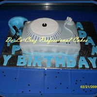 The Turntable Cake This was a fun cake to do, but very time consuming!!!!! Special thanks to my husband who helped me all the way! I am so proud of him...