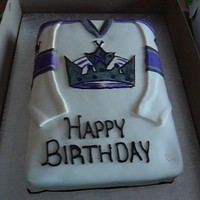 La Kings Jersey Cake Fondant covered 11x15 2 layer cake. Hand painted LA Kings logo.