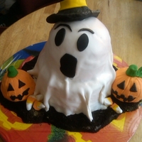 Happy Halloween Ghost cake I made for a Halloween party this past Saturday. Yellow cake and devils food cake with cookies and cream filling. Two eight inch...