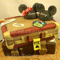 Cruise Line Travel Cake This cake was done for a couple that loves "The Mouse" They are taking there honeymoon on a cruise and wanted there pre-wedding...