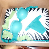 Lingerie Shower Cake Inspired by cakes on CC. Fondant bra, panties and bow. I made the bra cups several days in advance to dry so they would keep their shape.