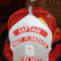 Fireman Helmet Groom's Cake I used all the tools in my arsenal for this cake (fondant, gumpaste, rice crispy treat, and royal icing). The groom is a firefighter.
