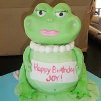 Southern Frog Head sculpted from cereal treats and modeling chocolate and covered in fondant. Body in vanilla cake with vanilla buttercream. fondant...