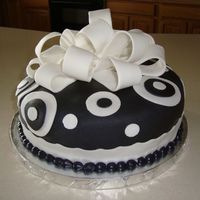 Black And White Pokadot This cake was for a ladie's 50th Birthday. Very simple. You can do this style of cake for almost any occasion using different colors...