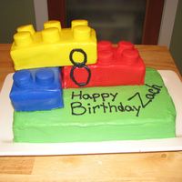 015.jpg My son found a cake online that he liked and asked me to do it as well. I tried... not my best cake for sure... The legos are covered in...