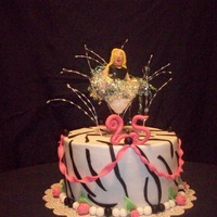 Niece's 25Th Birthday Turtle cake with homemade caramel. We had the girl figure sort of laying in the glass, but had trouble with her breaking, so ended up just...