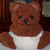 Baby Shower Bear Cake Wilton stand up bear pan. I added the diaper and blue diaper pins - she was having a boy. I had fun making the "fur" out of...