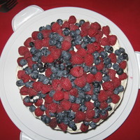 Red Velvet Cake The second of two 50th Surprise Birthday cakes. Homemade red velvet cake covered in cream cheese frosting topped with red raspberries and...