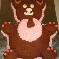 Teddy Bear Girl Baby Shower Cake Covered in chocolate buttercream. Make with multiple size cake pans.