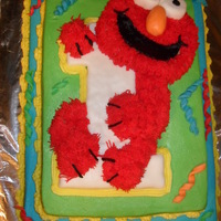 Elmo 1st birthday-buttercream with fondant accents, elmo and no 1 is rice krispy treats.
