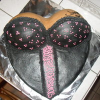 Corsette All buttercream with the birthday boys name tattooed.