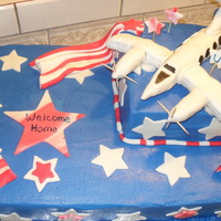 Welcome Home! airplane made out of RKT and covered in fondant.