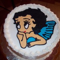 Betty Boop red velvet cake with cream cheese filling and buttercream transfer.