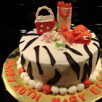 Shopping Buttercream with fondant accents.