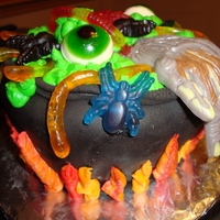 Witch's Cauldron Made for a cakewalk at the school where I worked. Gummy candy filled the chocolate cake and chocolate fondant pot!