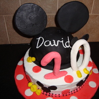 Mickey Mouse Cake Fondant ears and gumpaste number 10. Made for a diehard Disney fan.