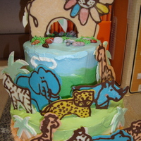 Animal Baby Shower Chocolate chip pound cake and vanilla pound cake frosted with a whipped buttercream. First time make chocolate transfer animals.