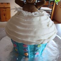 Teddy Bear Cupcake Made with the Wilton Cupcake cake pan. Buttercream with fondant bear and accents