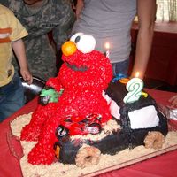 Elmo Riding In Truck this is elmo rct in choclate cake truck with vanilla sand only thing you cant eat is the motorcycles elmo is holding