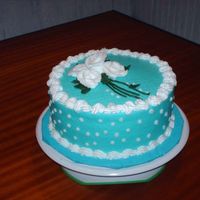 Teal Blue this was a practice cake that i have to do next week for a 62 year old woman, needless to say we ate cake all week. peace