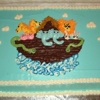 Noah's Ark Cake Made for a co-worker's baby shower. All buttercream. My first major attempt at figure piping. Used bag striping technique to make the...