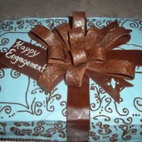 Engagement Cake Vanilla bean cake filled with chocolate mousse and a layer of fresh strawberries. Iced in buttercream to match the bride's colour...