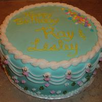 Birthday Cake For Two 8" vanilla butter cake filled with chocolate fudge filling, covered in fondant with buttercream decorating - I was asked for a plain...