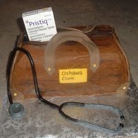 Doctor's Bag With some help from other cc users I put together my first attempt at a Doctor's bag cake. I wanted the handles to stand up - guess I...