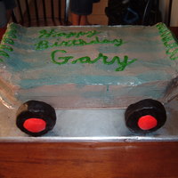 Grandsons Birthday Cake This is my grandson's birthday skateboard cake. It is an oreo cake that I tried to shape into a skateboard.