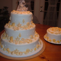 Seashell Wedding Cake Yellow cake with buttercream frosting. Seashells are all candy.