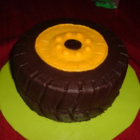 Truck Wheel Little cake for 1-year-old's birthday to accompany his bigger cake that had a big truck on it. All buttercream.