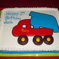 He Loves Trucks. All buttercream. Also did a little cake for the birthday boy to play in shaped like a wheel.