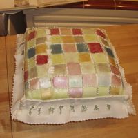 Quilted Pillow Cake Southern style coconut cake with Coconut flavored buttercream frosting. Covered in coconut flavored fondant and hand painted with luster...