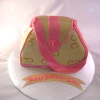 Small Coach Purse white cake, bc covered in mmf, C's painted on