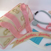 Coach Handbag For Nurse (C's Made With Cricut Cake) strawberry cake, bc icing covered with mmf, C's made with my new Cake Cricut. MMF accents