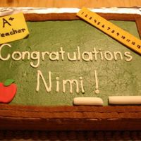 Congratulations I made this cake for a friend who is getting an award for teaching. It was a rush job, but I am pretty happy with it. It is iced in...