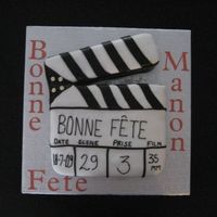 Movie Clapper Movie Clapper cake made for a friend's sister who is a movie reporter. It was my first time working with modeling chocolate and Satin...