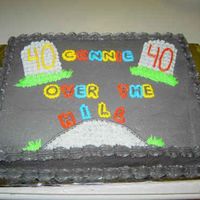 Over The Hill Cake This was a cake I did for a lady at work. I didn't want it all to be dark, so I added a little bit of color.