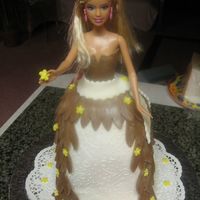Barbie Cake Carrot cake and cream cheese filing.Decorations are fondant!Thanks for looking!