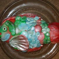 Fish I used a fish-shaped pan to bake it in. The scales and gills are MMF. I colored it using aerosol food spray and pearl dust. The eye is a...