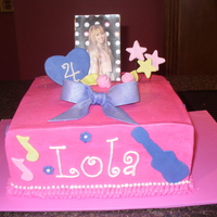 Hannah Montana Buttercreme with Fondant accents.