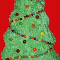 Christmas Tree I made this for a Christmas gathering. It was super simple. I just used the triple star tip and used mini M&Ms for lighs and Skittles...