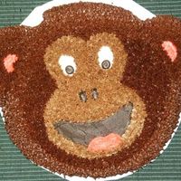 Monkey This is one of my son's 1st birthday cakes. He is CMD cookies and cream cake with mostly chocolate buttercream. It is the Animal...