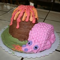 Volcano And Dragon First time attempting something like this. I think it turned out cute for my first. All buttercreme.