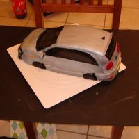 Jetta Gti Birthday Cake This was the second cake I made. I really wasn't happy with it, but I thought it was pretty good for my first car cake. I learned a...