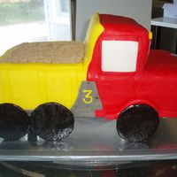 Dump Truck inspired by the dump truck in the wilton fondant book.