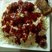 Kelly's Birthday sour cream pound cake with buttercream noodles. meatballs are rice krispie treats with cocoa added, garlic bread is toasted slice of pound...