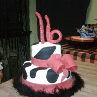 Harley's 16Th she was turning the BIG 16, and loves cow print. So I gave her a cow print cake with a big 16!