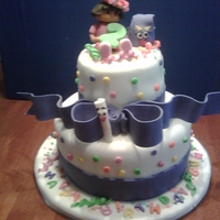 Dora 2Nd Birthdy DORA, BACKPACK, MAP AND BOW ARE 50/50 GUMPASTE/FONDANT. OTHER DECORATIONS ARE FONDANT.