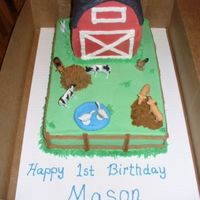 Barnyard 9x13 covered in buttercream. The barn is a 10x10 cake cut in 4 squares. Stacked 3 together and carved the roof. Cover the barn in...
